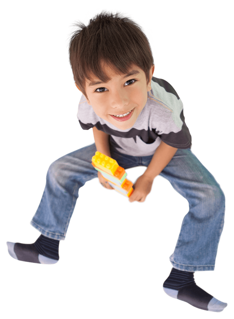 Smiling Boy Playing with Toy Blocks on Transparent Background