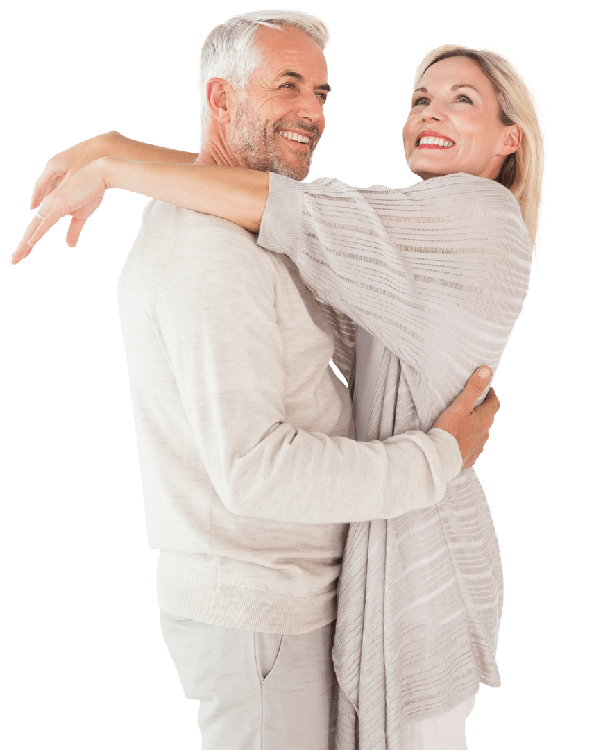 Joyful Senior Couple in Transparent Embrace Celebrating Together