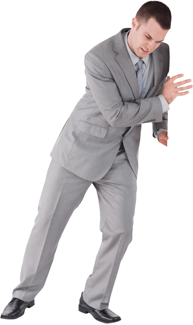 Focused Businessman Pushing Invisible Barrier on Transparent Background