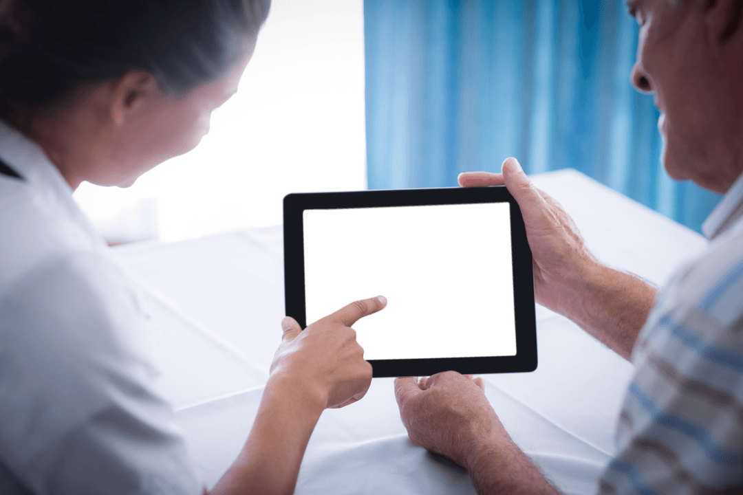 Doctor Using Tablet with Patient in Transparent Clinical Discussion