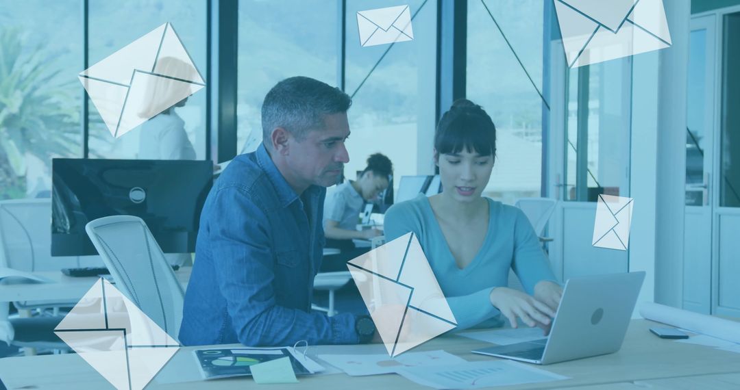 Team Collaborating on Email Marketing Strategy in Modern Office