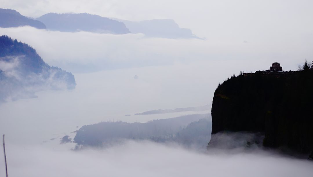 Scenic Mountain Vista with Thick Fog and Misty Valleys - Free Images, Stock Photos and Pictures on Pikwizard.com