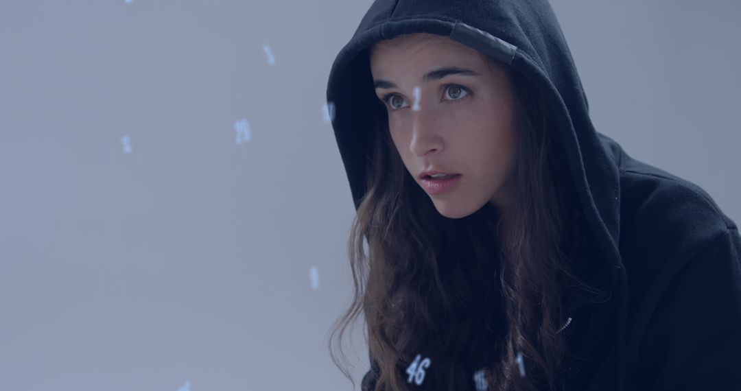 Caucasian Female Hacker Engaged in Cybersecurity Task