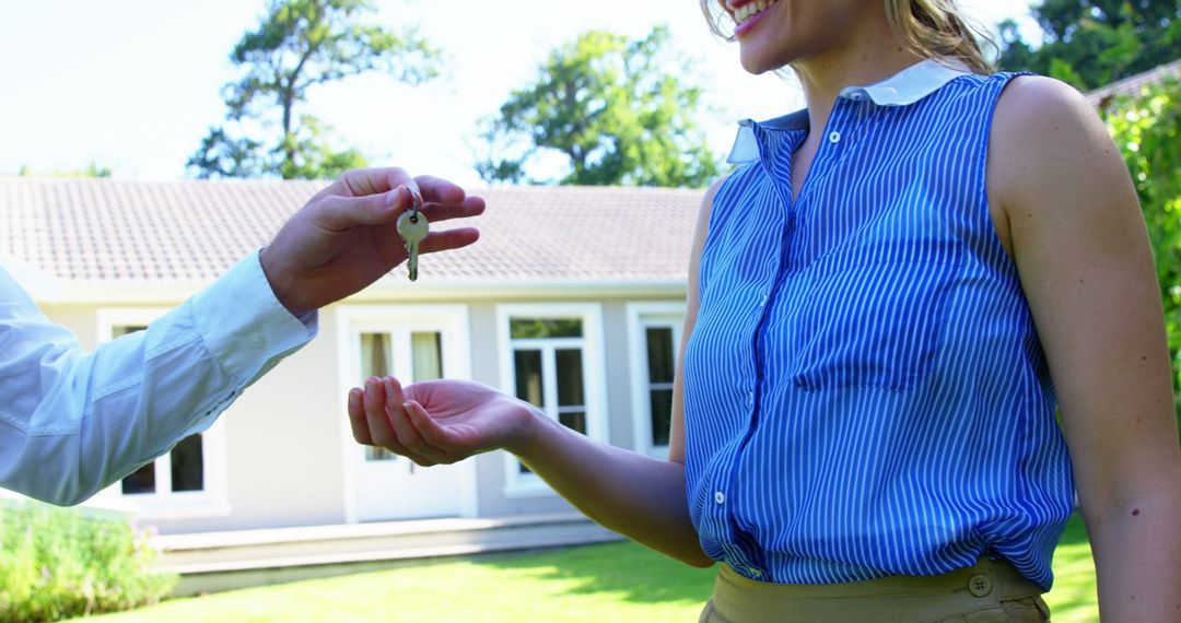 Real Estate Agent Handing Keys to New Homeowner Outdoors - Free Images, Stock Photos and Pictures on Pikwizard.com