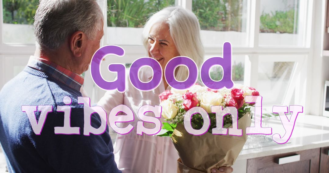 Happy Senior Couple Embracing with Positive Vibes Message