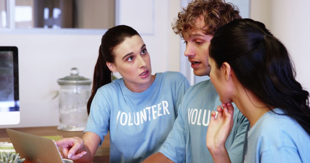 Young Volunteers Engaged in Collaborative Discussion