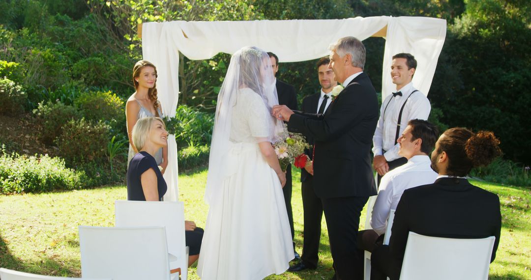 Outdoor Garden Wedding Ceremony with Bride and Groom - Free Images, Stock Photos and Pictures on Pikwizard.com