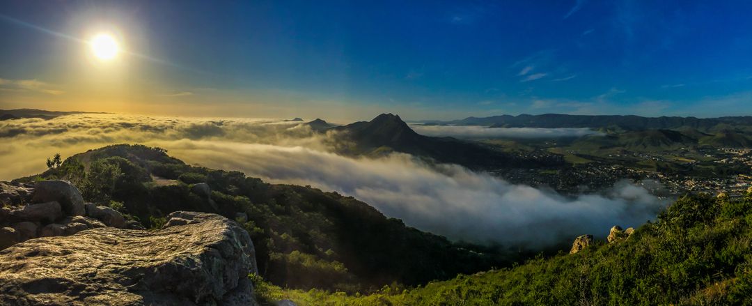 Panoramic View of Foggy Valley at Sunrise from Mountain Top - Free Images, Stock Photos and Pictures on Pikwizard.com