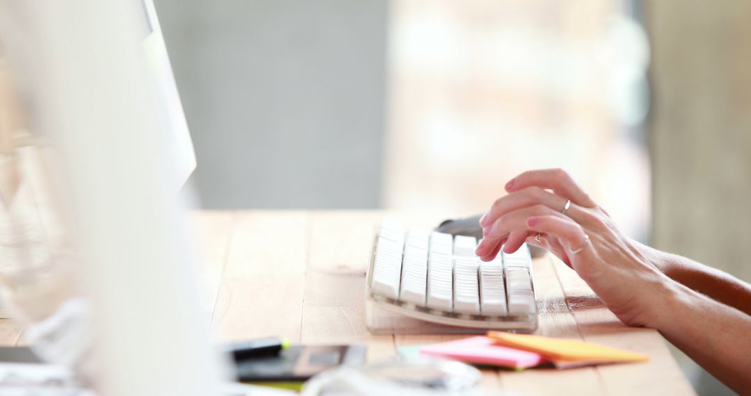 Person Typing on Keyboard in Modern Workspace - Free Images, Stock Photos and Pictures on Pikwizard.com