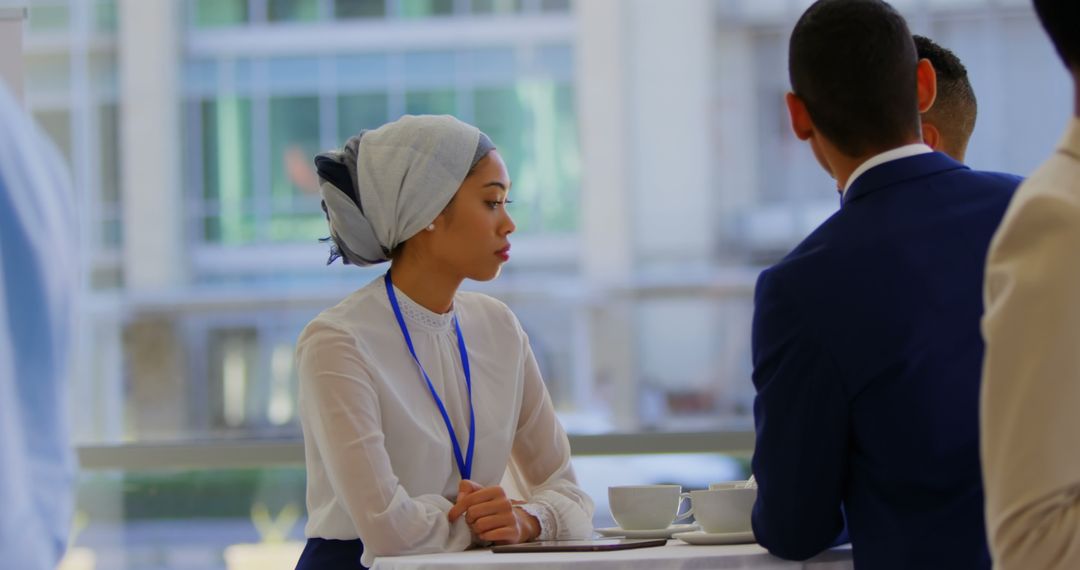 Young Business Professionals Networking at Seminar