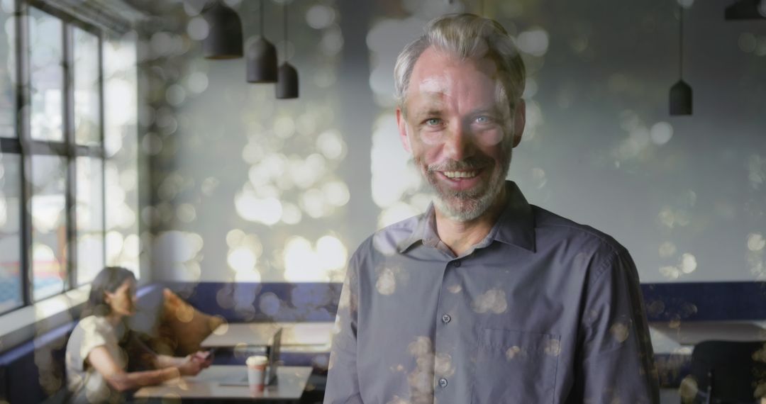 Double Exposure of Smiling Businessman and Natural Scenery