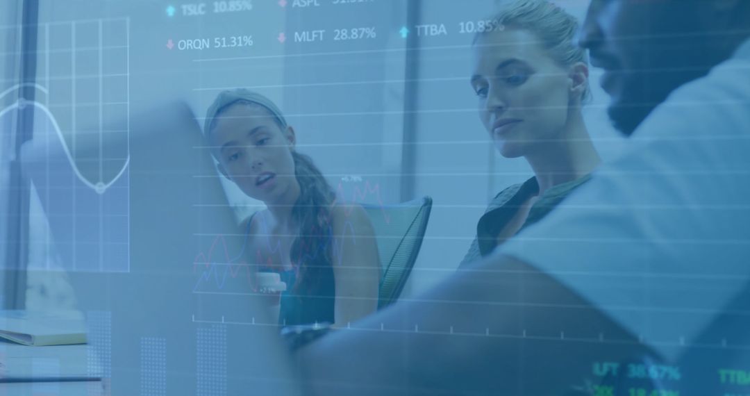 Diverse Team Analyzing Financial Data and Trends in Modern Office