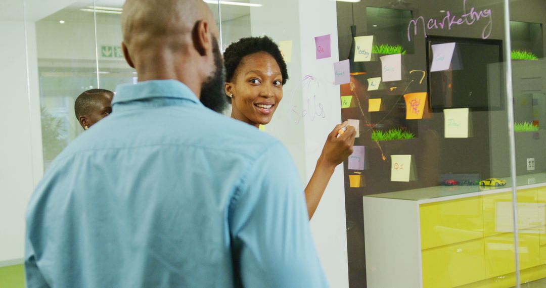 Diverse Professionals Engaged in Collaborative Office Brainstorm