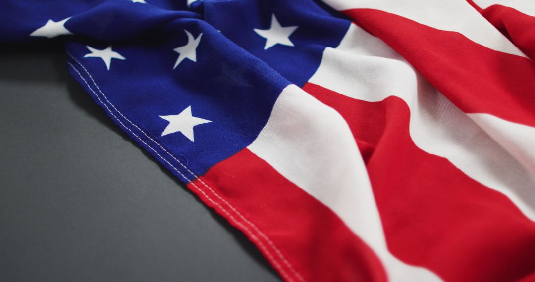 Crumpled American Flag on Gray Background