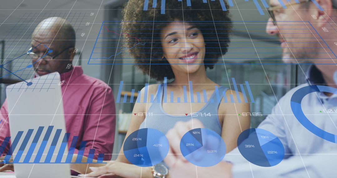 Business Team Analyzing Data with Digital Graphic Overlays