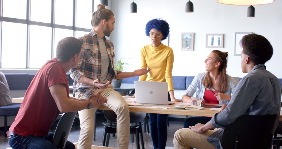 Diverse Business Team Engaging in Modern Office Meeting