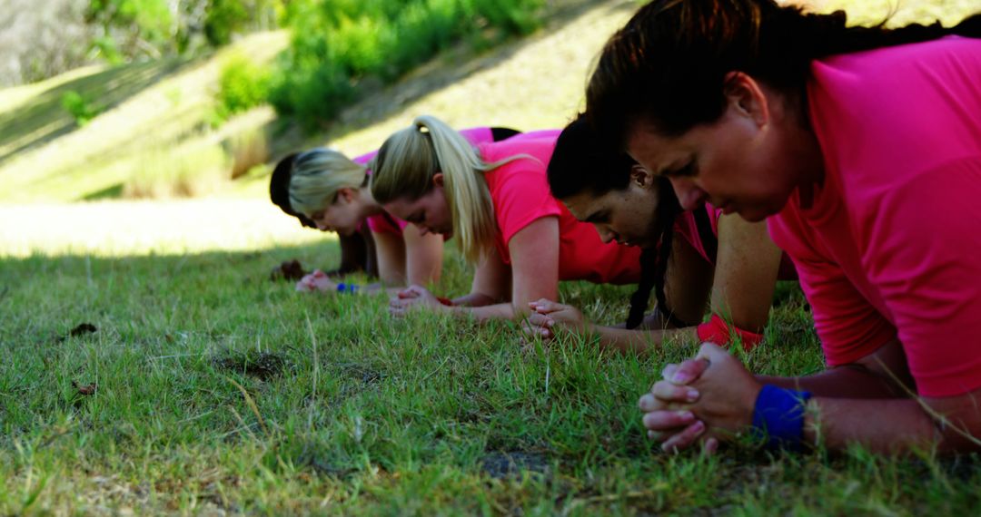 Diverse Group Exercising Outdoors with Focused Intensity - Free Images, Stock Photos and Pictures on Pikwizard.com