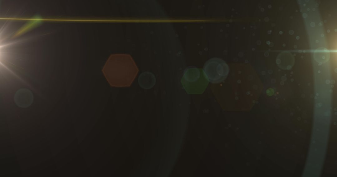 Abstract Green Light and Lens Flare on Brown Background