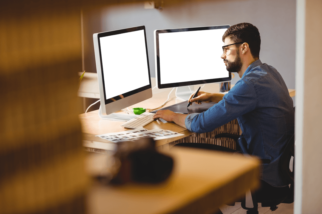 Graphic Designer Working on Creative Project with Digital Tools