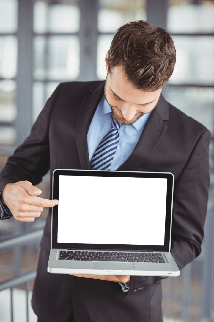 Businessman Pointing at Transparent Laptop Screen Mockup