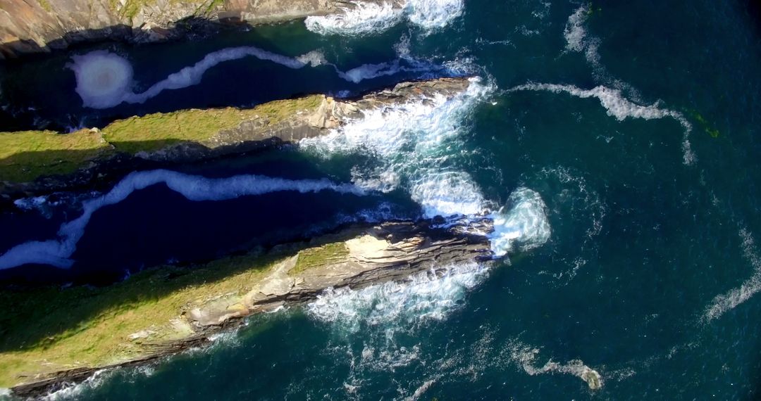 Aerial View of Rugged Cliff Coastline with Waves Crashing - Free Images, Stock Photos and Pictures on Pikwizard.com