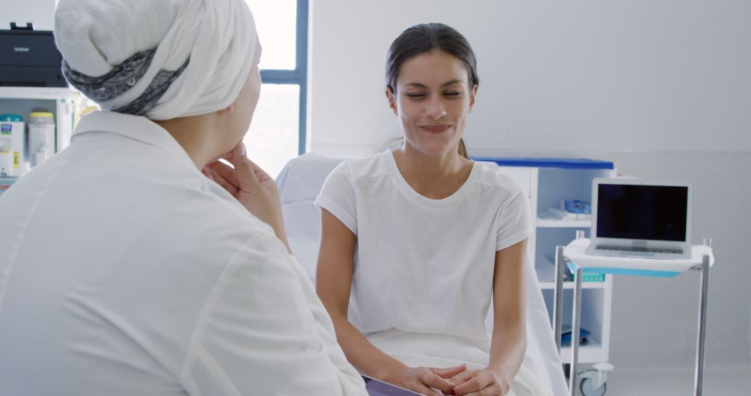 Doctor Consoling Patient During Medical Appointment - Free Images, Stock Photos and Pictures on Pikwizard.com