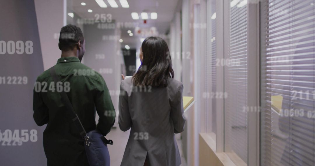 Diverse Colleagues Walking in Office with Data Overlays