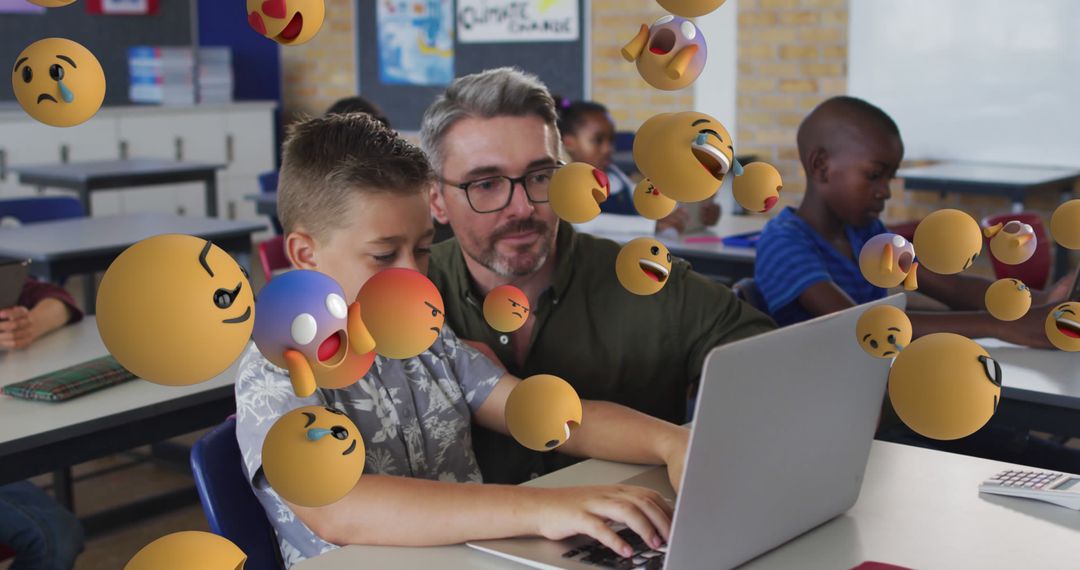 Teacher Assisting Boy with Laptop Surrounded by Emojis in Classroom - Free Images, Stock Photos and Pictures on Pikwizard.com