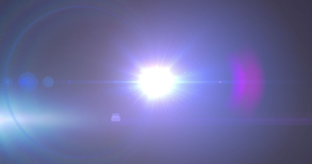 Bright Intensifying Lens Flare on Dark Abstract Background