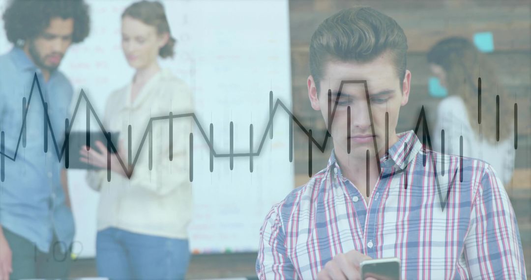 Young Professionals Collaborating in Modern Office with Digital Communication