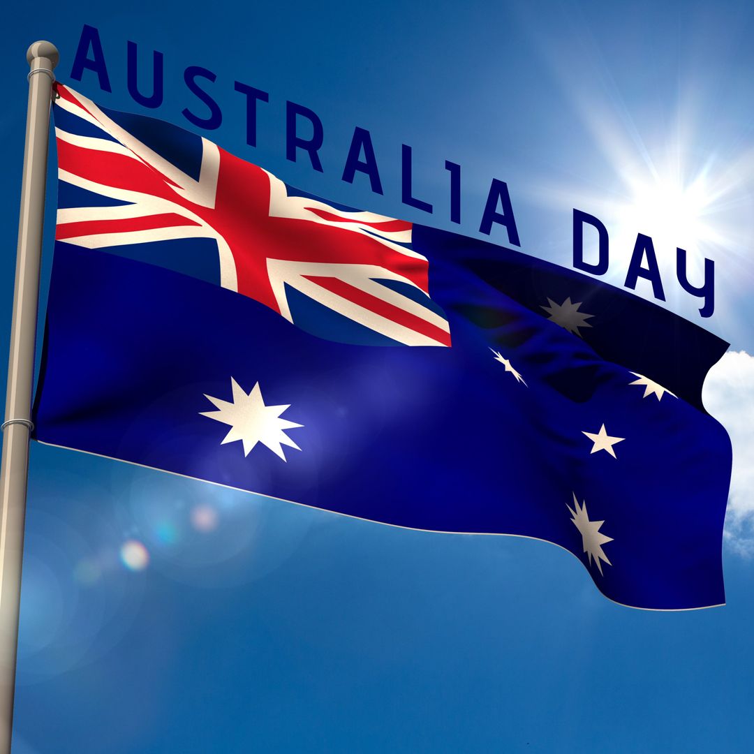 Australian Flag Waving Against Clear Blue Sky on Australia Day