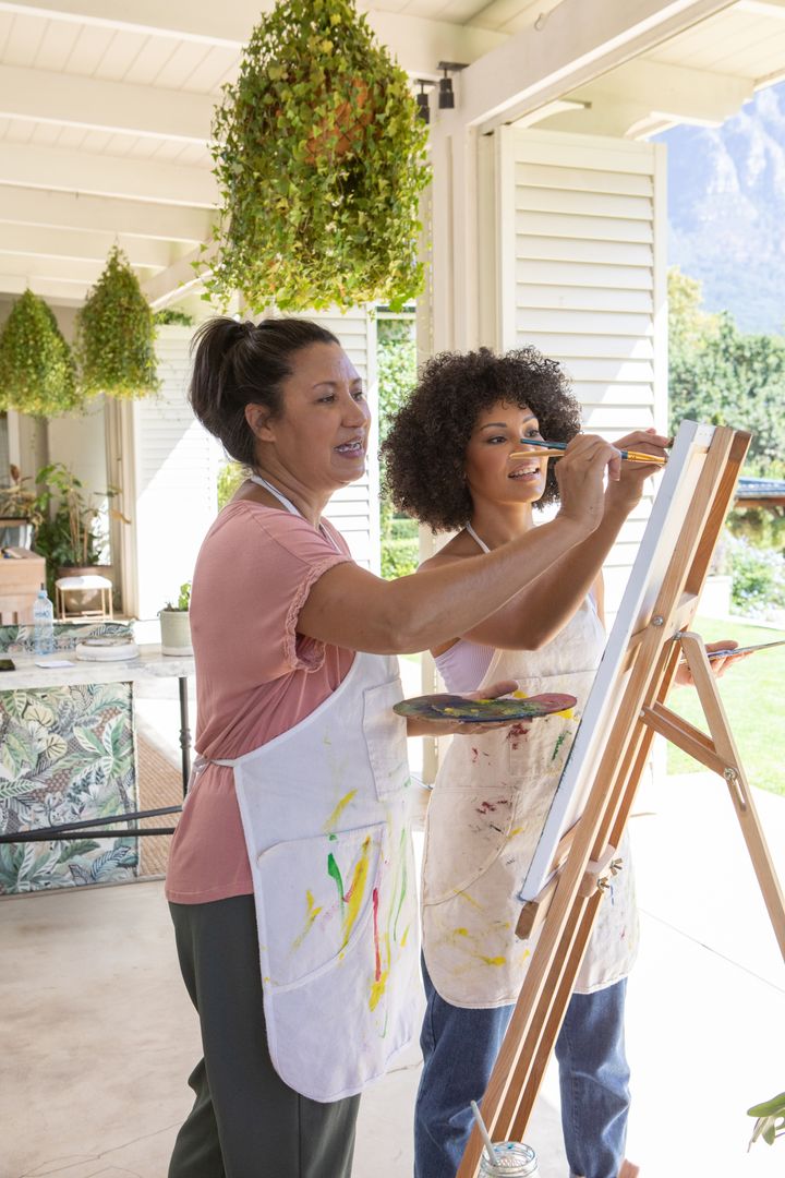 Creative Outdoor Painting Session with Instructor and Student