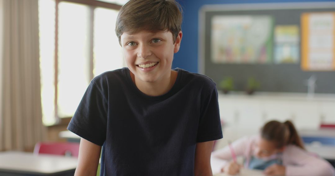Smiling Schoolboy in Classroom Engaged in Learning Activity