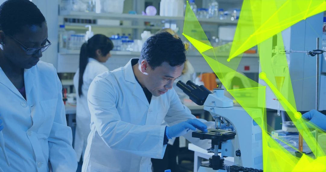 Diverse Scientists Conducting Experiments Using Microscope