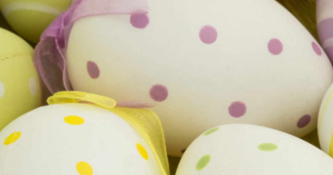 Easter Eggs with Colorful Spots and Ribbons Close-up