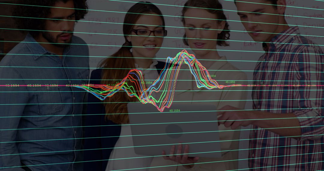 Diverse Business Team Collaborating on Data Analytics in Office