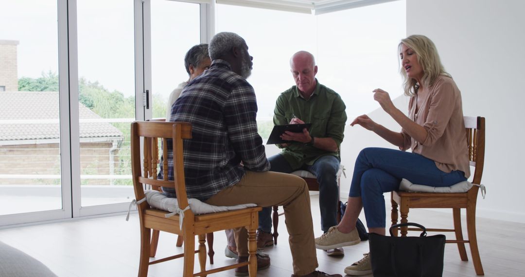 Diverse Seniors Engaging in Conversation at Home