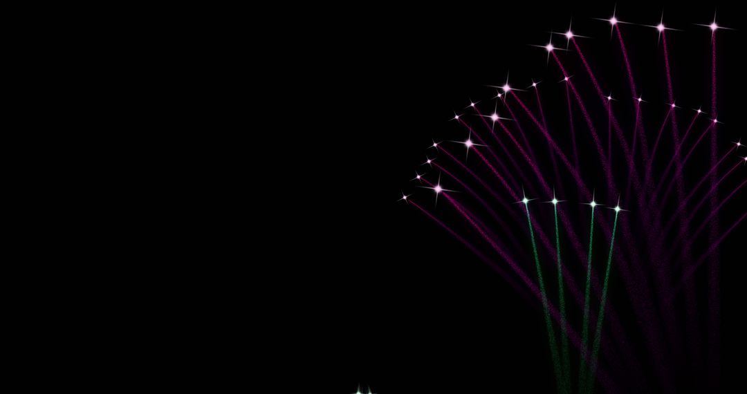 Sparkling Fireworks Bursting on Dark Night Sky