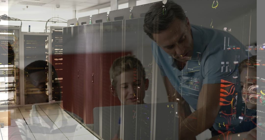 Teacher Guiding Students Through Digital Interface in Server Room