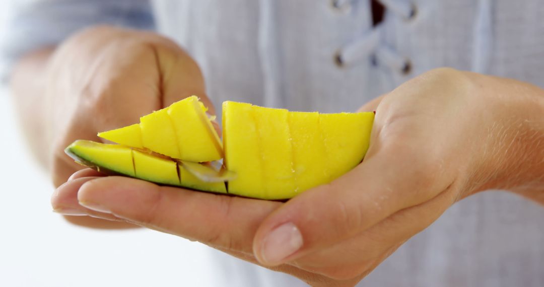 Person Slicing Ripe Mango Fruit in Their Hands - Free Images, Stock Photos and Pictures on Pikwizard.com