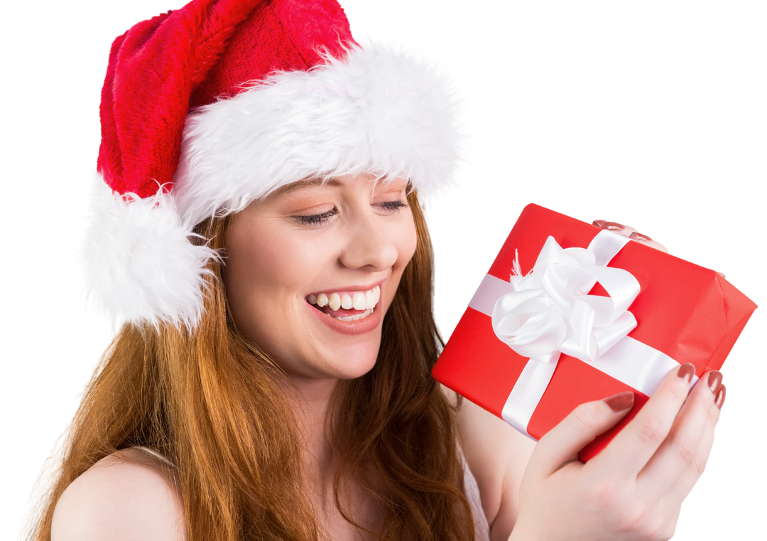 Cheerful Redhead Woman Holding Christmas Gift on Transparent Background - Download Free Stock Images Pikwizard.com