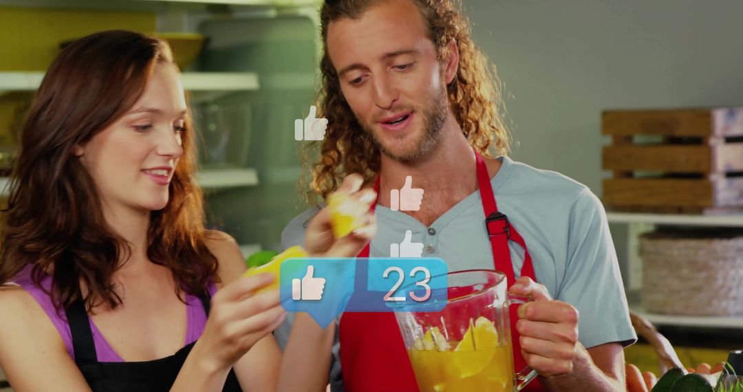 Couple Blending Citrus Beverage Generating Social Media Engagement