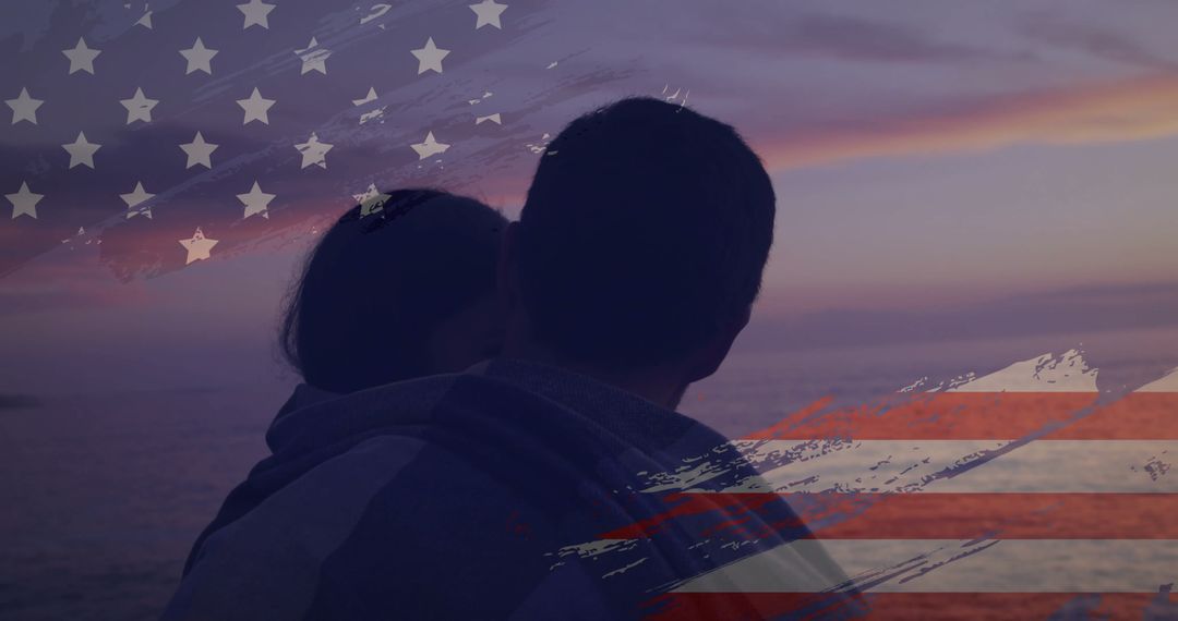 Silhouette of Couple Embracing on Beach With American Flag Overlay
