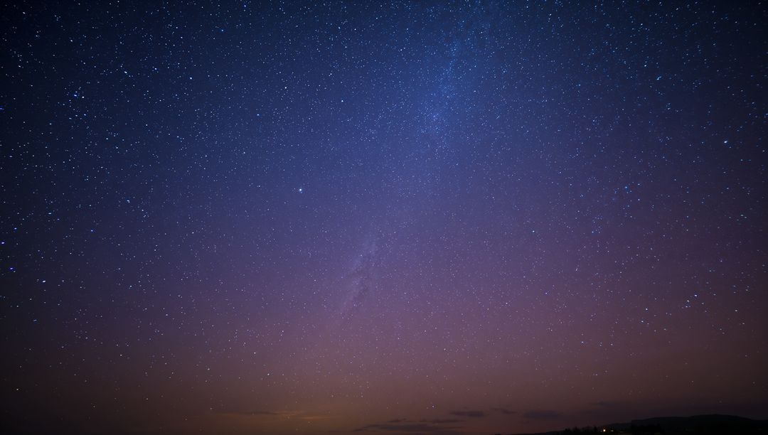 Milky Way Over Remote Hills at Twilight, Starfield Sky with Indigo to Purple Gradient