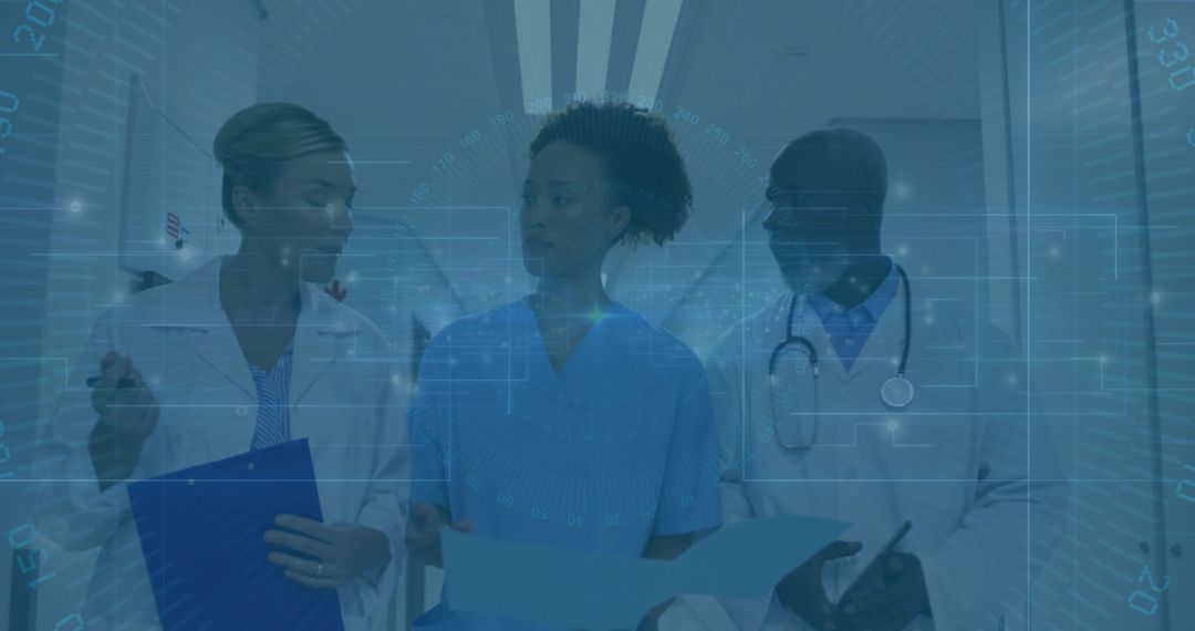 Medical Team Discussing Patient Files in Hospital Corridor