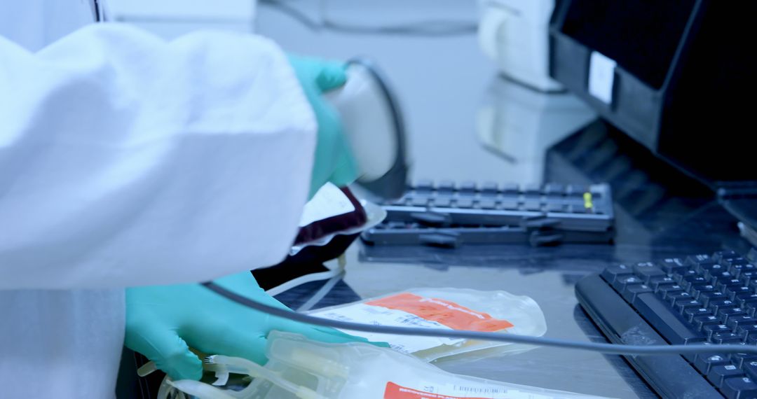 Lab Technician Scanning blood bags for Testing - Free Images, Stock Photos and Pictures on Pikwizard.com