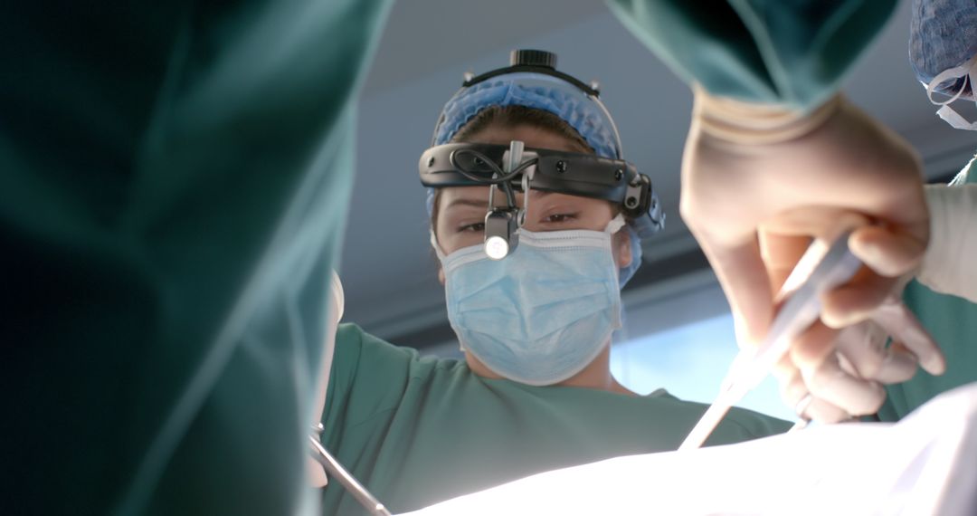 Surgeon Performing Procedure with Precision Surgical Tools