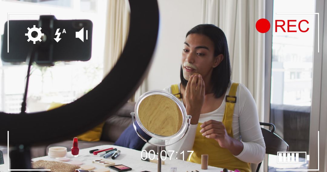 Influencer Filming Makeup Vlog with Ring Light and Smartphone