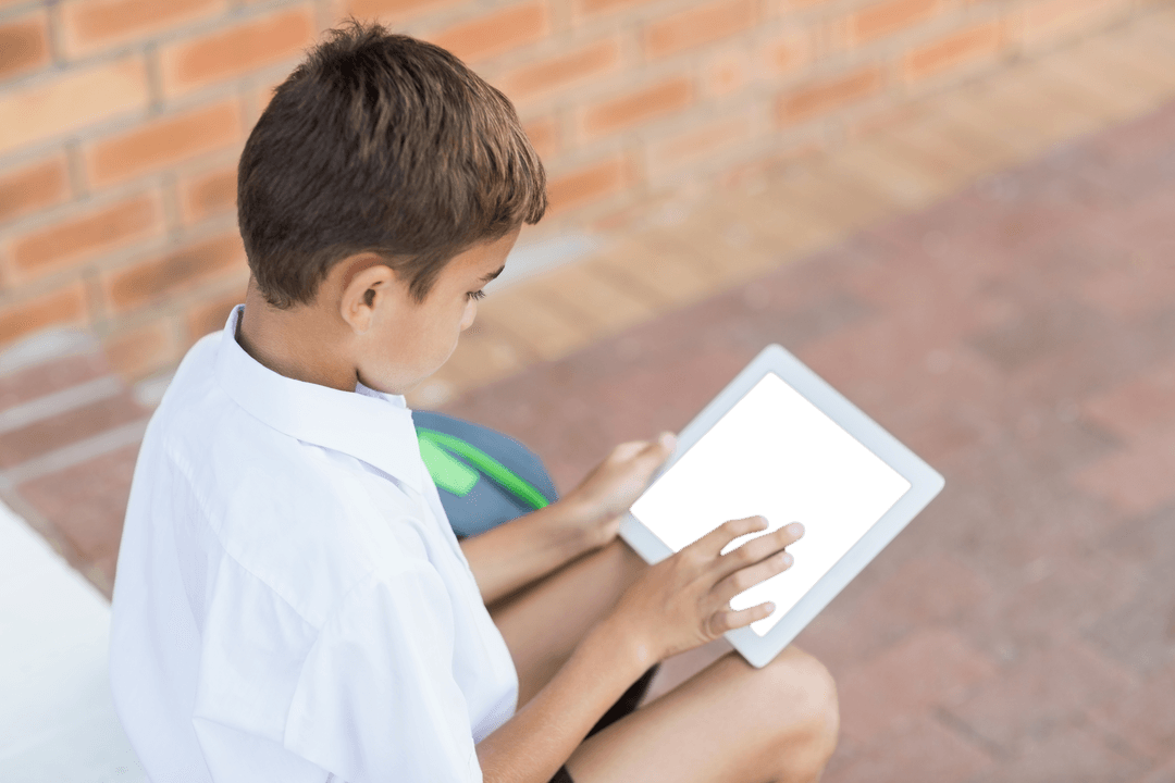 Transparent Tablet Interaction Kid in White Shirt Detail View