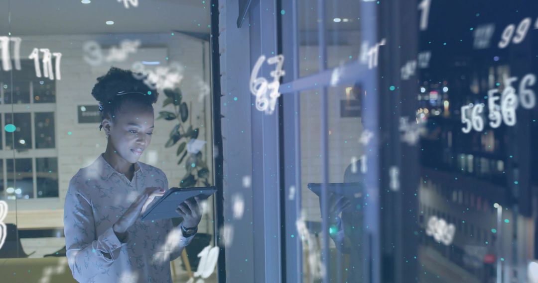 Woman Using Tablet with Data Visualization Reflections